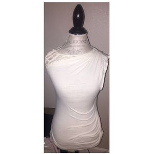 White tank top from purchased from Anthropologie.